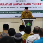 Pjs. Wali Kota Palu, Muchsin Husain Pakaya memberi sambutan pada peluncuran Gerakan Wakaf Uang SINAR di Kemenag Kota Palu, Jumat (10/10/2024). (Foto: Prokopim Setda Kota Palu/Jufri)