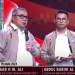 Pasangan calon Gubernur dan Wakil Gubernur Sulawesi Tengah nomor urut 1, Ahmad HM Ali (AA) - Abdul Karim Al Jufri (AKA) pada debat perdana di Metro TV, Jakarta, Rabu (16/10/2024) malam. (Foto: tangkapan layar Metro TV)