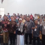 Foto bersama usai Kenduri oleh BNPT dan FKPT Sulteng di Parimo, Sabtu (9/11/2024). (Foto: ist)