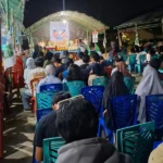 Calon Gubernur Sulawesi Tengah nomor urut 1, Ahmad HM Ali melanjutkan kampanye terbatas di Lapangan Madamba, Kelurahan Tondo, Kecamatan Mantikulore Palu, Minggu (17/11/2024) malam. (Foto: Tim Media Koalisi BerAmal)