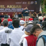 Ketua KPU Kota Palu, Idrus menyampaikan sambutan pada Apel Akbar Badan Adhoc Pilkada Kota Palu di Palu, Sulawesi Tengah, Selasa (12/11/2024). (Foto: bmzIMAGES/Basri Marzuki)