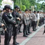 Sejumlah personel polisi pada apel siaga pengamanan malam pergantian tahun di Mapolresta Palu, Selasa (31/12/2024). (Foto: Humas Polresta Palu)