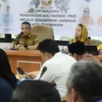 Wali Kota Hadianto bersama Wawali Imelda pada peluncuran OPA Bergerak Bersama di Palu, Senin (28/7/2025). (@Prokopim Setda Koat Palu/Imron)