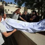 Mourners attend the burial of Palestinian Christians Saad Salama and Foumia Ayyad, who were killed in an Israeli strike on the Holy Family Church, according to medics, at the Greek Orthodox Saint Porphyrius Church, in Gaza City, July 17, 2025. REUTERS/Dawoud Abu Alkas