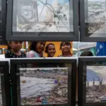 Pameran foto bencana yang digelar di Huntap Duyu, Maret 2019 silam. (©ANTARAFOTO/basri marzuki)