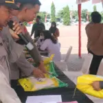 Warga membeli beras SPHP pada Gerakan Pangan Murah kerjasama Polda Sulteng dengan Bulog Sulteng di Mapolda Sulteng, Rabu (6/8/2025). (©Humas Polda Sulteng)