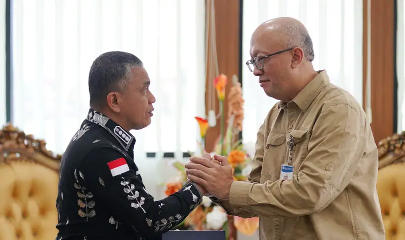 Wali Kota Palu Hadianto Rasyid bersama Kepala Perwakilan BI SUlteng, Muhammad Irfan Sukarna, Kamis (4/9/2025). (©Prokopim Setda Kota Palu/Jufri)