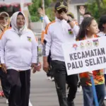 Kontingan Kecamatan Palu Selatan pada penutupan Porkot IV 2025 di Halaman kantor Wali Kota Palu, Minggu (7/9/2025). (©Prokopim Setda Kota Palu/Iwan)