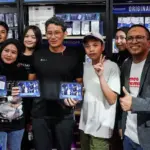 Sandiaga Uno (tengah) bersama para peserta kejuaraan reparasi CPU Ponsel di Jakarta, Minggu (31/8/2025). (©CGC 2025)