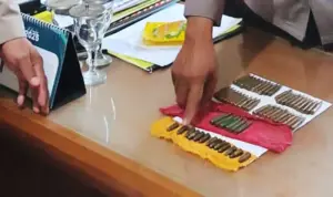 Warga Desa Lape Serahkan 59 Butir Amunisi ke Satgas Madago Raya