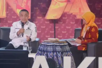 Wali Kota Palu Hadianto Rasyid pada Simposium Nasional Akuntansi di Untad, Rabu (10/9/2025). (©Prokopim Setda Kota Palu)