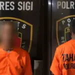 Tersangka GS yang ditangkap aparat Polres Sigi atas dugaan pencruian menggunakan cadar. ©Humas Porles Sigi)