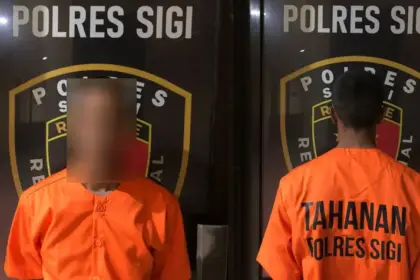 Tersangka GS yang ditangkap aparat Polres Sigi atas dugaan pencruian menggunakan cadar. ©Humas Porles Sigi)