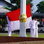 Pengibaran bendera pada upacara peringatan Hari Sumpah Pemuda di Lapangan wali Kota Palu, Selasa (28/10/2025). (©Prokopim Setda Kota Palu/Iwan)