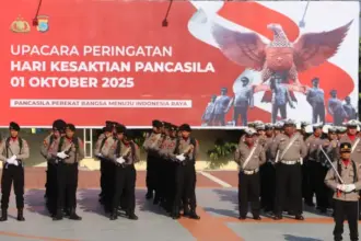 Personel Polda SUlteng pada upacara peringatan Hari Kesaktian Pancasila di Mapolda Sulteng, Rabu (1/10/2025). (© Humas Polda Sulteng)