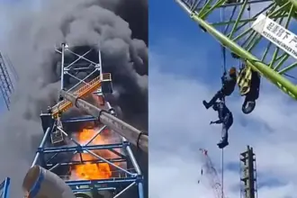 dua pekerja berada di atas scrubber PT SLNC saat terjadi kebakaran di kawasan PT IMIP, Morowali, Minggu (12/10/2025). (© tangkapan layar FB)