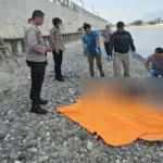 Petugas mengidentifikasi mayat yang ditemukan warga di pinggir sungai sekitar jalan Raja Maili, Palu, Kamis (2/10/2025). (© Humas Polresta Palu)