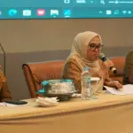 Sekot Irmayanti (tengah) pad apembukaan Bimtek Manajemen Pengelolaan Pajak bagi koperasi se-Kota Palu di Palu, Selasa (11/11/2025). (©Prokopim Setda Kota Palu/Iwan)