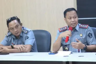 Kakanwil Kemenkum SUlteng, Rakhmat Rinaldy (kanan). (©Humas Kanwil Kemenkum Sulteng)