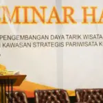 Plt. Asisten Bidang Perekonomian dan Pembangunan Setda Kota Palu, Rahmad Mustafa pada pembukaan seminar hasil wisata minat khusus di palu, Selasa (18/11/2025). (©Prokopim Setda Kota Palu/Jufri)