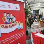 Stan OJK Sulteng pada Festival Pembiayaan dan UMKM di Palu, Jumat (21/11/2025). (©bmzIMAGES/Basri Marzuki)