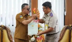BPN Palu Serahkan Sertifikat Aset Pemkot, Target 2025 Tercapai