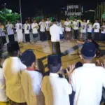 Atraksi rebana kolosal pada Pesta Kesenian Balaroa di Huntap Balaroa, Jumat (5/12/2025). (©Prokopim Setda Kota Palu/Imron)
