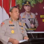 Karo Ops Kombes Pol Giuseppe Reinhard Gultom membacakan sambutan Kapolda Sulteng pada pembukaan (Latpraops Lilin Tinombala 2025 di Aula Rupatama Lantai II Mako Polda Sulteng, Rabu (17/12/2025). (©Humas Polda Sulteng)