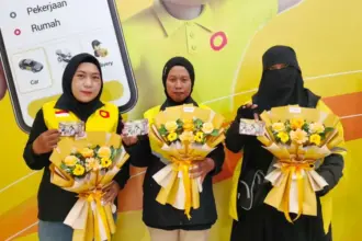 Pengemudi perempuan Maxim yang diberi apresiasi. (©Maxim)