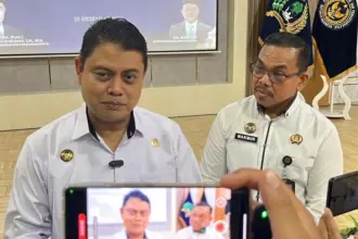 Kakanwil Ditjenpas Sulteng Bagus Kurniawan bersama Kalapas Kelas IIA Palu, Makmur di Palu. (©Ditjenpas Sulteng)