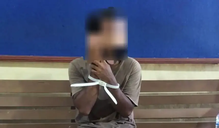 RA, warga Desa Siniu yang dimankan polisi karena melakukan KDRT terhadap isterinya di Parimo, Jumat (16/1/2026). (©Humas Polres Parimo)