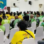 Suasana sosialisasi QRIS dan literasi keuangan kepada pengemudi ojek online oleh BI Sulteng, Selasa (4/2/2026). (©BI Sulteng)