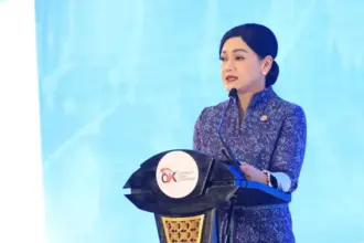 Pjs Ketua Dewan Komisioner OJK Friderica Widyasari Dewi menyampaikan sambutan pada Pertemuan Tahunan IJK 2026 di Jakarta, Kamis (5/2/2026). (©OJK)