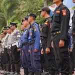 Inspakesi pasukan pada Apel Siaga yang dihadiri Pemkto Palu di Mapolresta Palu, Kamis (26/2/2026). (©Prokopim Setda Kota Palu/Jufri)