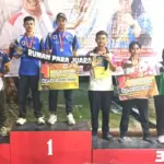 Pratu Heriyanto menunjukkan medali perak nomor double open putra pada kejuaraan Internasional UNG Cup 2026 di Universitas Negeri Gorontalo, Sabtu (7/2/2026). (©Pendam23)