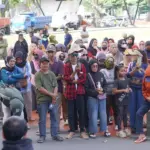 Sejumlah warga lingkar tambang Poboya berunjukrasa di depan Kantor Wali KOta Palu, Rabu (18/2/2026). (©Prokopim Setda Kota Palu/Iwan)