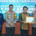 Pnyerahan penghargaan Pelayanan Publik dari Ombudsman RI ke Polresta Palu, Selasa (3/2/2026). (©HUmas Polresta Palu)