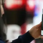 Ilustrasi warga melakukan registrasi dengan face recognition dalam program Semantik Telkomsel. (©Telkomsel)