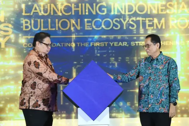 Menko Ekonomi Airlangga Hertarto bersama Kepala Eksekutif Pengawas Perbankan OJK Dian Ediana Rae pad apeluncuran roadmap pengembanga kegiatan usaha dan Bullio di jakarta, Jumat (6/3/2026). (©OJK)