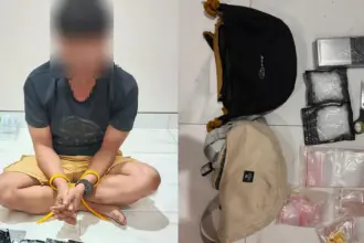 A alias U bersama barang bukti sabu yang disita aparat Ditresnarkoba Polda SUlteng, Rabu (11/3/2026). (©Ditresnarkoba Polda Sulteng)