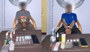 AD dan AH beserta barang bukti sabu di Mapolres Banggai, Minggu (1/3/2026). (©Humas Polres Banggai)