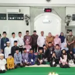 Wali Kota Palu bersama para peserta usai membuka Audisi Tilawah Qur'an di Palu, Senin (2/3/2026). (©Prokopim Setda Kota Palu/Imron)
