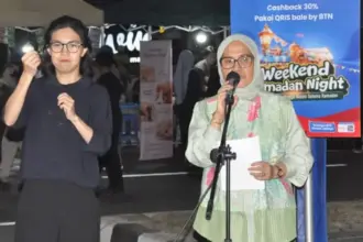 Sekot Irmayanti menyampaikan sambutan pada penutupan Weekend Ramadhan Night di Jlan Prof Muh Yamin, Palu, Minggu (15/3/2026). (©Prokopim Setda Kota Palu/Imron)