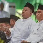 Gubernur Sulteng Anwar Hafid (kanan) bersama Menteri ATR/Kepala BPN Nusron Wahid pad aHaul ke-58 Guru Tua di Kompleks Perguruan Alkhairaat Palu, Rabu (1/4/2026). (©bmzIMAGES/Basri Marzuki)