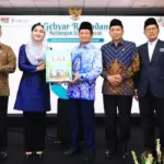 Penutupan Gerak Syariah sekaligus peluncuran buku Panduan Keuangan Untuk Semua Agama di Jakarta, Kamis (2/4/2026). (©OJK)