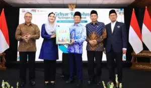 Penutupan Gerak Syariah sekaligus peluncuran buku Panduan Keuangan Untuk Semua Agama di Jakarta, Kamis (2/4/2026). (©OJK)